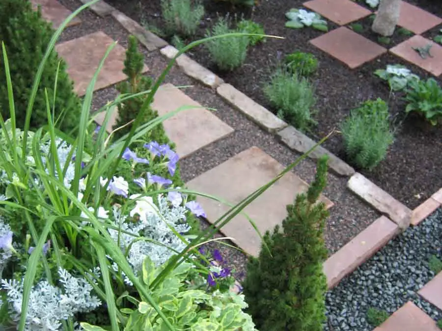 Flagstone squares and low planting in the English Garden
