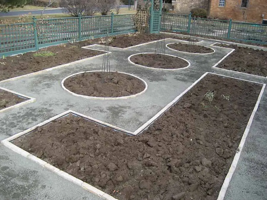 New bed lines in the Potager Garden, edged with steel and buff flagstone
