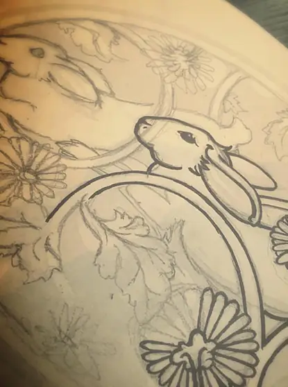 Leslie Ebert's pencil sketch of the leaping hares for the Stonegate emblem