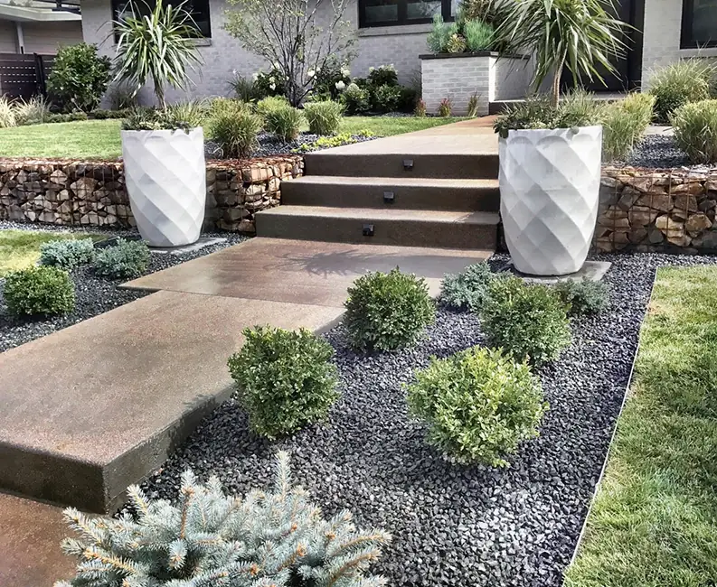 A modern front walk, before and after the new beds and planters. After